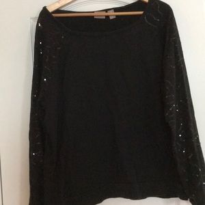 Black with sequins down the arms. Chico’s, size 3!